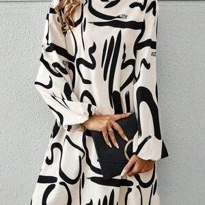 Elegant Cream and Black Patterned Long Sleeve Dress